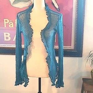 Crocheted ruffle edged jacket